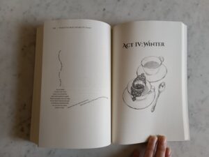 An open spread of pages, with a concrete poem in the shape of a pipe on the left page, and an illustration of tea cups, a strainer and a spoon with the words, Act IV: Winter